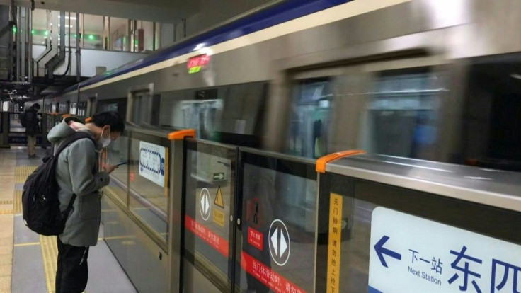 People in China are slowly returning to work on Monday after an extended holiday designed to slow the spread of a virus that has already killed more than 900 people.