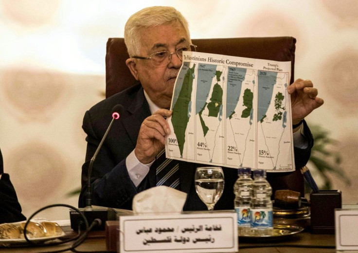 Palestinian president Mahmud Abbas shows maps of historical Palestine during a February 2020 Arab League meeting on President Donald Trump's proposed Middle East plan