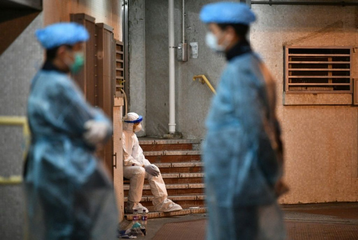 Two infections in a Hong Kong apartment building sparked an evacuation
