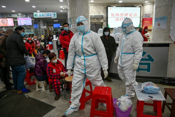 In the Wuhan hospitals visited by AFP, people queue up in long lines to see a doctor. The wait is so long that some have brought their own chairs