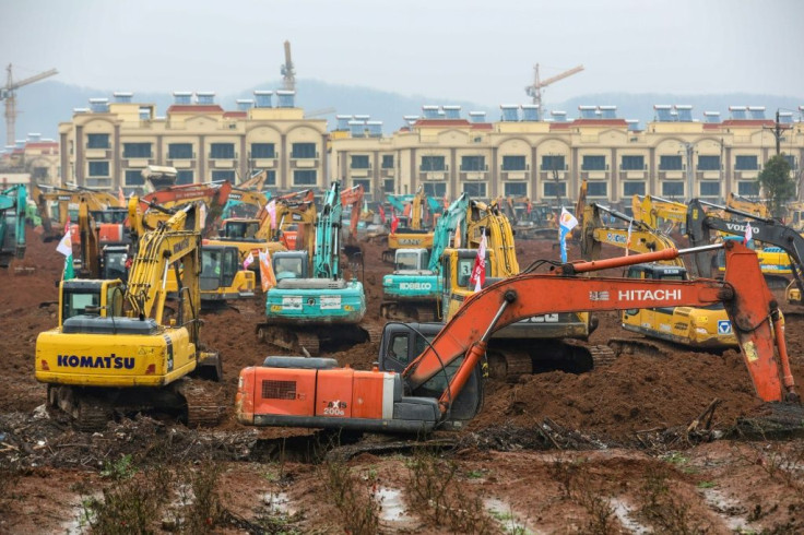 On the outskirts of Wuhan, hundreds of workers who arrive just days earlier are building two new hospitals from scratch