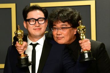 "Parasite" writers Han Jin-won and Bong Joon-ho (R) have secured a historic Oscars win a year after the 100th anniversary of South Korean cinema in 2019