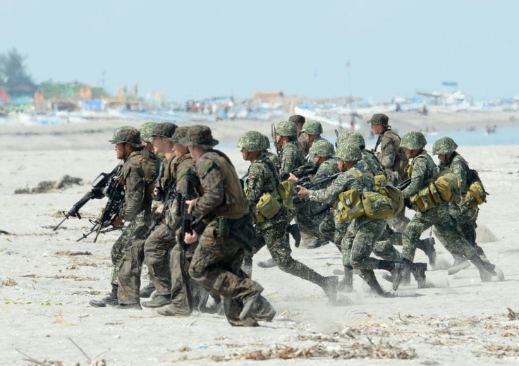 Philippine and US Marines taking part in a joint  exercise in San Antonio, Zambales province, in 2014
