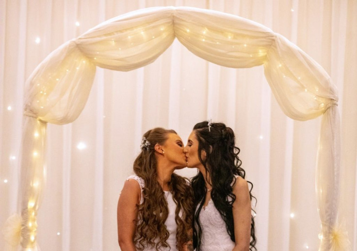 Robyn Peoples (L) and Sharni Edwards (R) tied the knot at a hotel near Belfast, after the new legislation came into effect on Monday