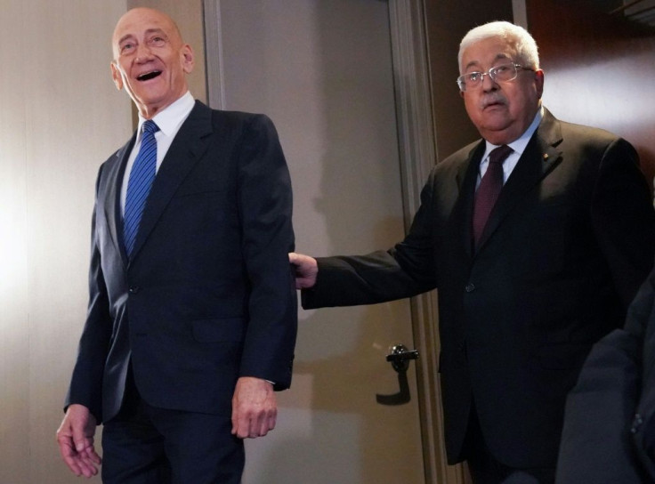 Palestinian president Mahmud Abbas (right) and former Israeli prime minister Ehud Olmert meet reporters after a UN Security Council session on US President Donald Trump's Middle East plan