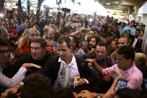 Guaido announced his return on Twitter before being greeted by a throng of cheering supporters at the Caracas international airport
