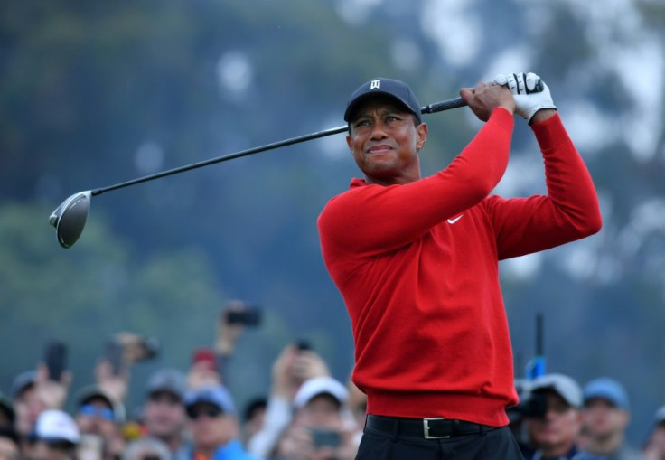 Tiger Woods, seen here teeing off on the 18th hole at Torrey Pines, says finding a solution to golf's ever-increasing hitting distance is "a delicate balancing act"