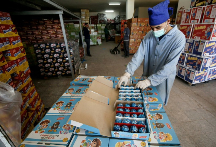 For the first time in years, sweets were exported from Gaza in December destined for Bahrain, with workers packing up boxes of large marshmallows covered in chocolate known as Crimpos