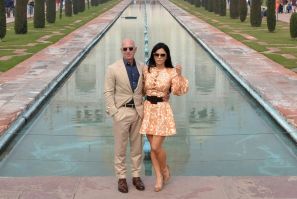 Amazon founder Jeff Bezos (L) and his girlfriend Lauren Sanchez pose during their visit to the Taj Mahal in India on January 21, 2020