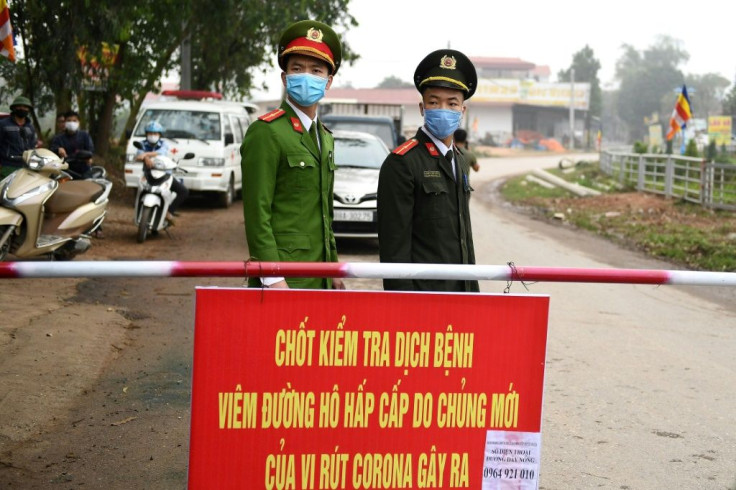 Checkpoints have been set up around Son Loi farming region near Hanoi after six cases of the deadly new coronavirus were found there