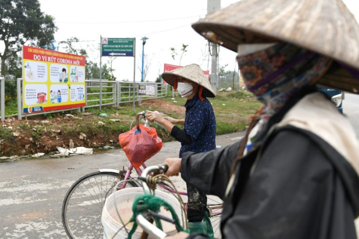 Police are warning people wanting to enter Son Loi near Hanoi that they will not be allowed to leave the quarantined area