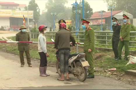Vietnamese authorities block the access to Son Loi commune in Vinh Phuc province, home of some 10,600 people, where five residents have been tested positive to the COVID-19 virus. The quarantine starts on February 13 and will last for 20 days.