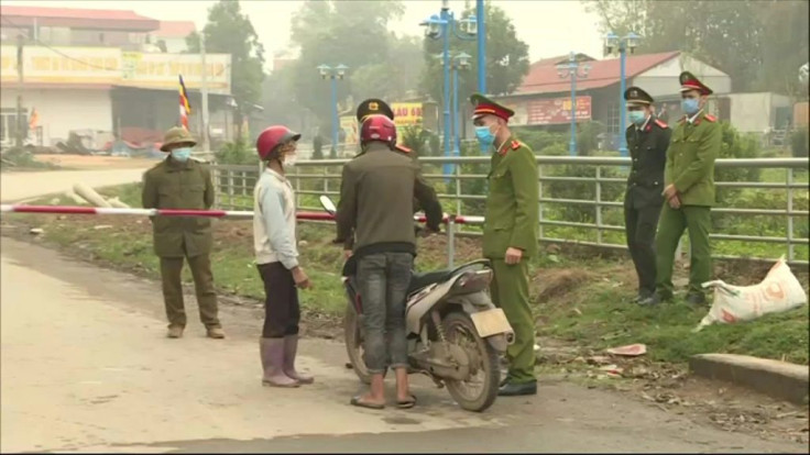 Vietnamese authorities block the access to Son Loi commune in Vinh Phuc province, home of some 10,600 people, where five residents have been tested positive to the COVID-19 virus. The quarantine starts on February 13 and will last for 20 days.