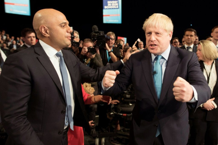 Javid's (L) resignation is a major upset at a turbulent time for Britain