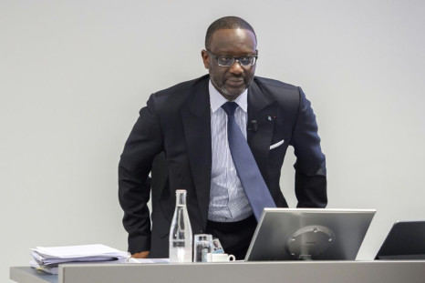 Tidjane Thiam, stepping down over a snooping scandal, said he was leaving Credit Suisse in a strong position after it unveiled a large jump in profit last year