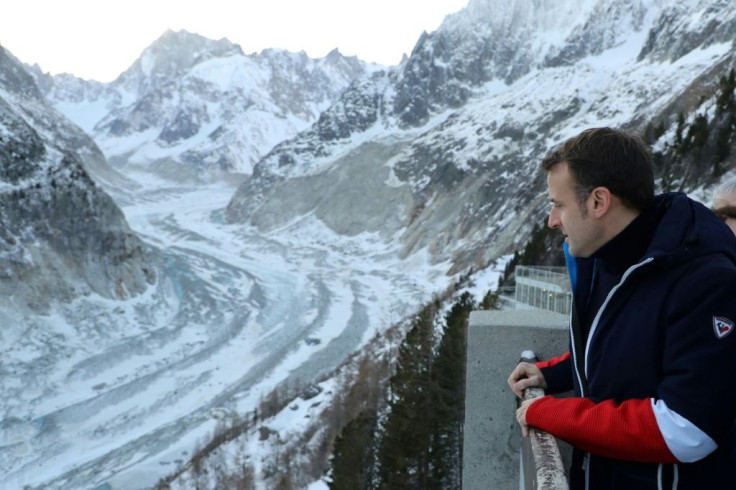 French president Emmanuel Macron urges action to curb global warming as he visits the 'Mer de Glace' glacier which has retreated some two kilometres since 1850.