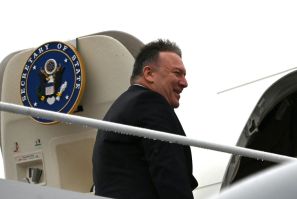 US Secretary of State Mike Pompeo boards his plane at Andrews Air Force Base en route to Munich on a trip that will include his first tour of sub-Saharan Africa