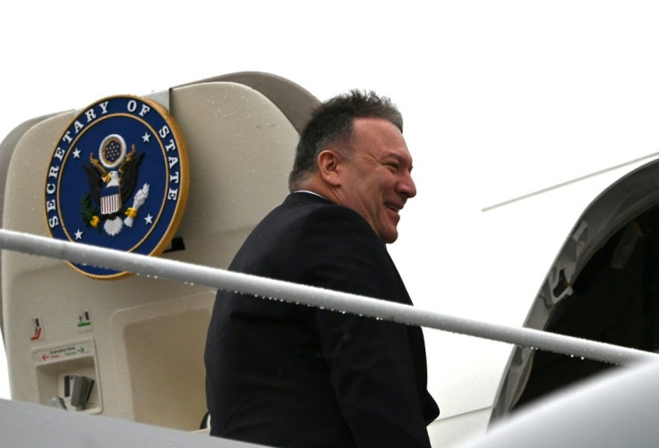 US Secretary of State Mike Pompeo boards his plane at Andrews Air Force Base en route to Munich on a trip that will include his first tour of sub-Saharan Africa