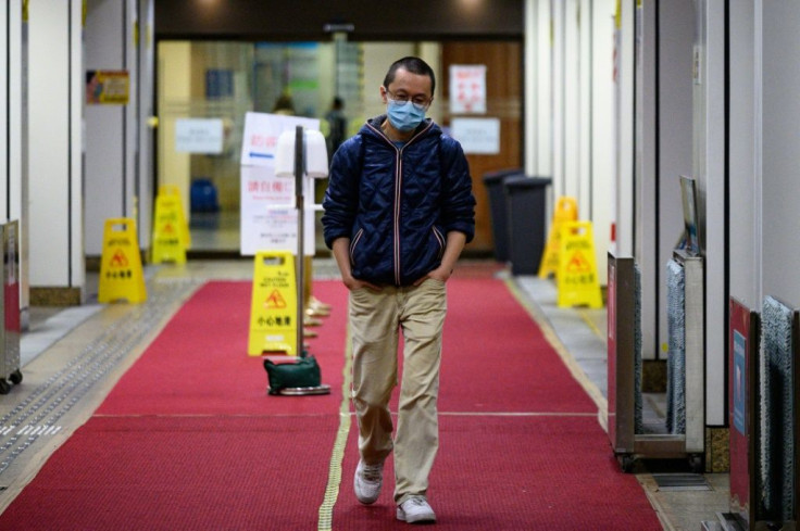 Alfred Wong works on the isolation ward at a Hong Kong hospital treating possible coronavirus patients and is desperate to avoid infecting his pregnant wife