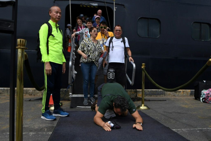 Passengers on the Westerdam were allowed to disembark in Cambodia on Friday after an uncertain two weeks at sea