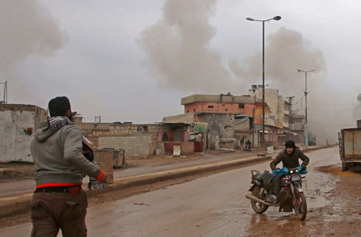 Some of the last remaining residents of the rebel-held town of Atareb flee as Syrian government forces draw ever closer in their offensive against the last major rebel pocket of Idlib