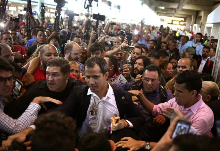 Juan Guaido received a mixed reception at the Caracas international airport on February 11 with some Maduro supporters calling him a 'fascist' and 'traitor'