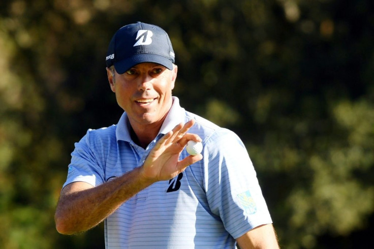 American Matt Kuchar acknowledges the crowd after making a par on the 12th green on the way to the halfway lead in the US PGA Tour Genesis Invitational at Riviera Country Club