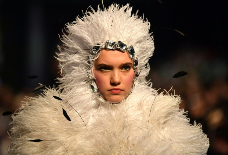 There were dresses with trains, flowers, crystals and feathers galore at Quinn's show in central London