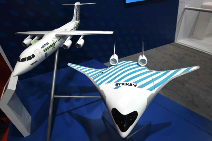 European plane maker Airbus has unveiled a model of a futuristic jet dubbed Maveric (right) which it says has the potential to cut fuel consumption by up to 20 percent compared to current single-aisle aircraft