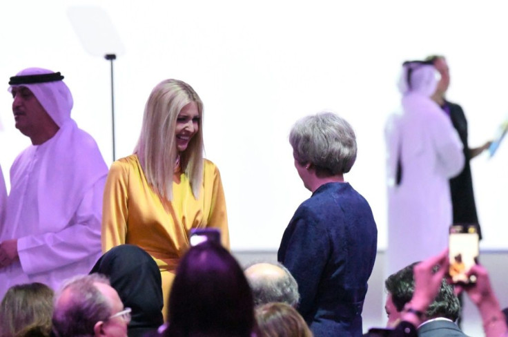 Ivanka Trump (L), senior White House adviser and daughter of the US president, speaks to Theresa May (R), the former British Prime Minister Theresa May