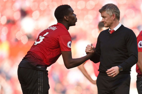 He's ours: Manchester United manager Ole Gunnar Solskjaer (right) does not want Paul Pogba (left) to leave the club
