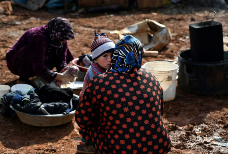 Syrian internally displaced persons (IDPs) are pictured in a camp in Sarmada in the north of Syria's northwestern Idlib province on February 17, 2020.