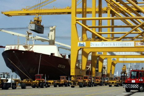 State-owned parent company Port and Free Zone World has offered to acquire the 19.55 percent of DP World's shares traded on the Nasdaq Dubai; A file picture from March 14, 2006 shows a cargo ship docked at Dubai's Jebel Ali port