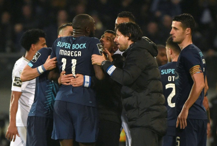 Players from both sides as well as Porto coach Sergio Conceicao attempted to stop Moussa Marega from leaving the pitch