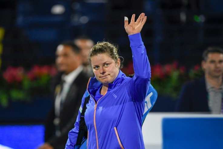 Kim Clijsters waved goodbye to the WTA event in Dubai following first round defeat to Garbine Muguruza