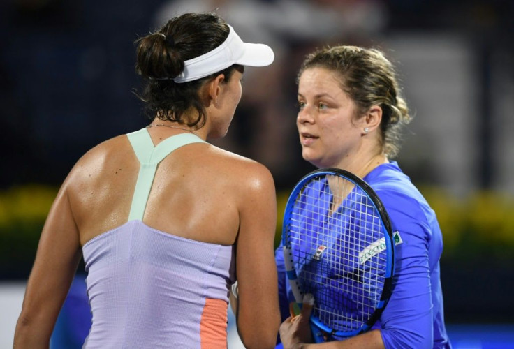 Clijsters says she is keen to continue despite her straight sets defeat to Muguruza