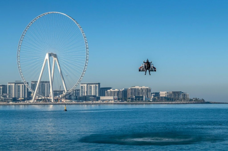 The carbon fibre wings worn by daredevil Vince Reffet for his "Jetman" stunt in the Gulf city state of Dubai are powered by four mini jet engines that he can control by his movements