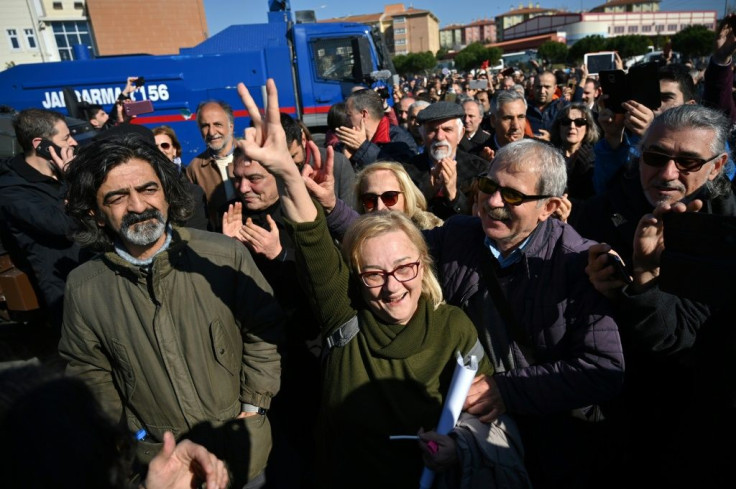 The verdict was greeted by cheers from Kavala's supporters