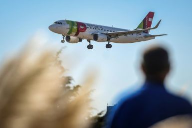 A plane of Portuguese TAP airline prepares to land at Humberto Delgado airport in Lisbon in October 2018