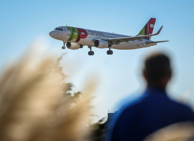 A plane of Portuguese TAP airline prepares to land at Humberto Delgado airport in Lisbon in October 2018
