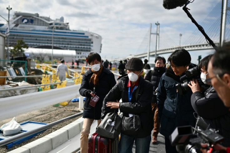 On Wednesday hundreds of passengers on the Diamond Princess who tested negative for the virus began leaving the ship