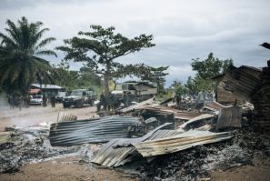 Burnt down houses are seen  in the village of Manzalaho near Beni, Democratic Republic of Congo on February 18, 2020, following an attack  allegedly perpetrated by the rebel group Allied Democratic Forces (ADF)