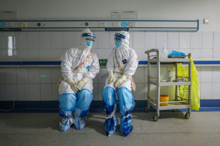 The Japanese government sent a plane bearing thousands of pieces of protective garments for the hard-hit central city of Wuhan