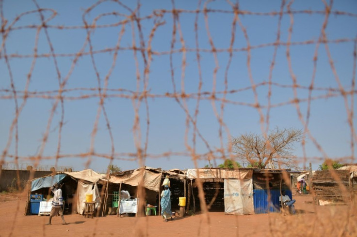 Thousands camped outside a UN base near Wau in an overcrowded tent city, too terrified to venture beyond the safety of peacekeepers