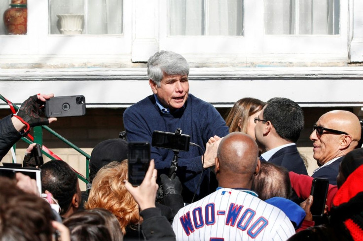 Former Illinois governor Rod Blagojevich greets supporters outside his house in Chicago on February 19 after his sentence was commuted by President Donald Trump