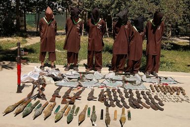 Haqqani network militants paraded with captured weapons in Kabul. The head of the network, who is also the deputy leader of the Taliban, said the group was fully committed to a peace deal with the United States