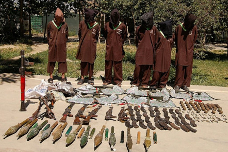 Haqqani network militants paraded with captured weapons in Kabul. The head of the network, who is also the deputy leader of the Taliban, said the group was fully committed to a peace deal with the United States