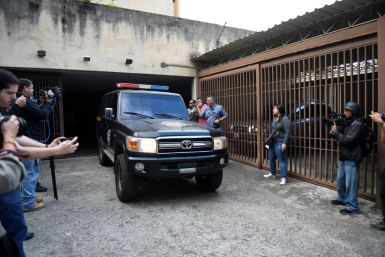 A vehicle used by Venezuela's military counterintelligence agency, the DGCIM, outside the home of opposition leader Juan Guaido's uncle during a search on Thursday