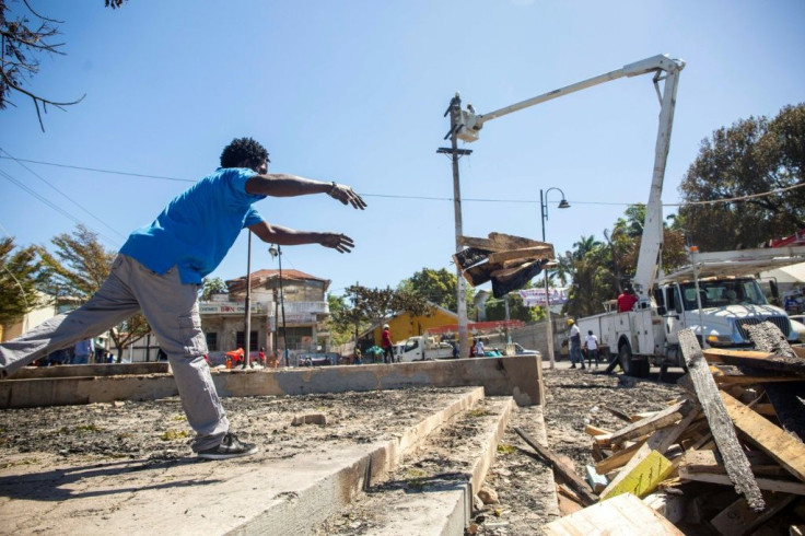 The Carnival parade grandstands in a central square in Port-au-Prince went up in flames after a police demonstration over poor working conditions