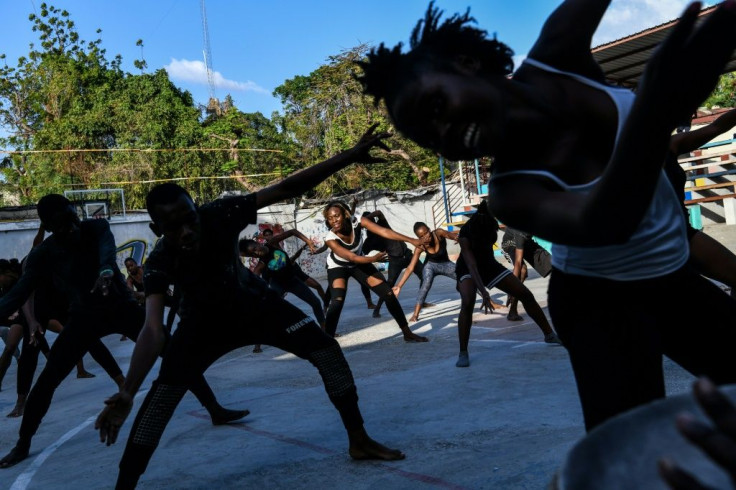 Haitian dancers rehearse for the upcoming Carnival parade in Port-au-Prince
